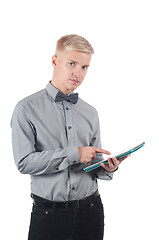 Image showing Man with tablet on his hands isolated on white