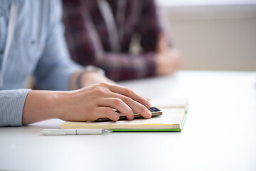 Image showing Young casual businessman using smartphone