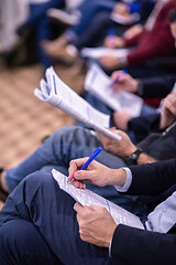 Image showing business people taking notes