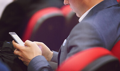 Image showing business people hands using smart phone