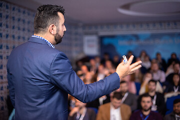 Image showing businessman giving presentations at conference room