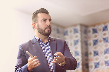 Image showing businessman giving presentations at conference room