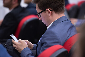 Image showing business people hands using smart phone