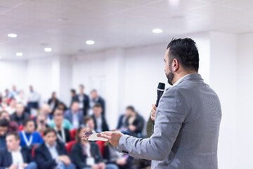 Image showing businessman giving presentations at conference room