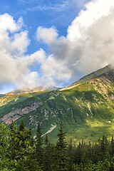 Image showing Polish Tatra mountains summer landscape with blue sky and white clouds.