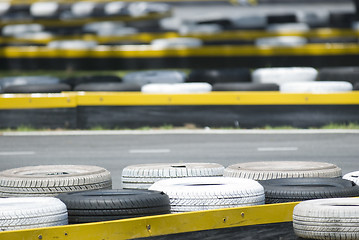 Image showing Old tyres at a race track