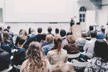 Image showing Woman giving presentation on business conference.