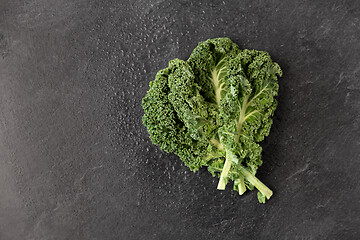 Image showing close up of kale cabbage on slate background