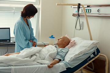 Image showing woman patient with cancer in hospital with friend