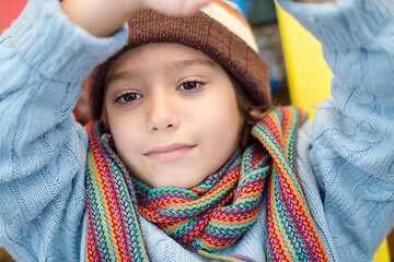 Image showing cute little boy having fun in playground