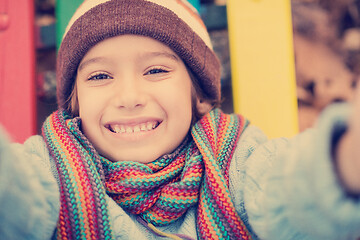 Image showing cute little boy having fun in playground