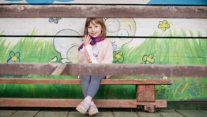 Image showing cute little girl  having fun in playground