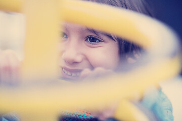 Image showing cute little boy having fun in playground