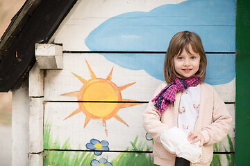 Image showing cute little girl  having fun in playground