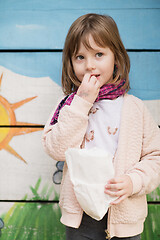 Image showing cute little girl  having fun in playground