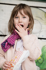 Image showing cute little girl  having fun in playground