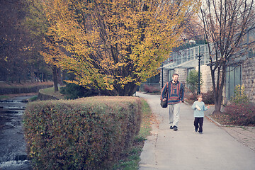 Image showing father and  child having fun together  in park