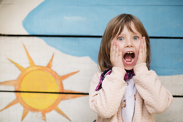 Image showing cute little girl  having fun in playground