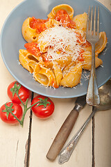 Image showing Italian snail lumaconi pasta with tomatoes