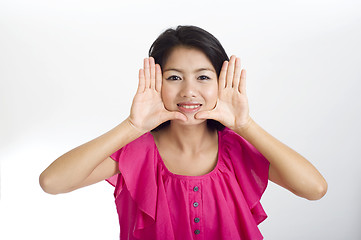 Image showing young asian woman framed face