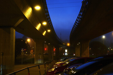 Image showing car parking near the metro overpass at night 