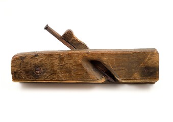 Image showing old wooden plane with a rusty blade