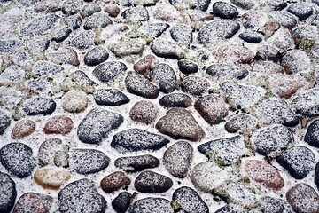 Image showing antique cobblestone pavement covered with snow