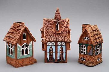 Image showing traditional christmas ceramic houses on a gray background