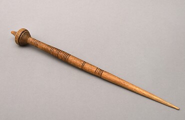 Image showing vintage wooden spindle on gray background