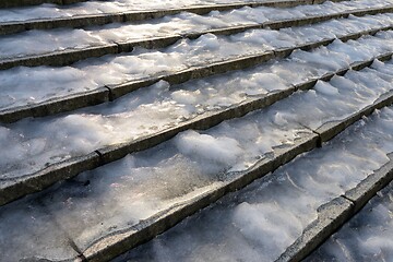 Image showing stone staircase covered with ice in the city