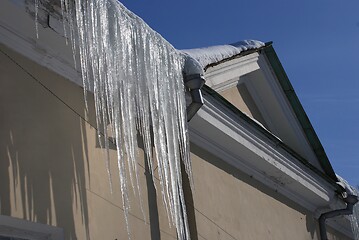 Image showing large icicles hanging from the roof 