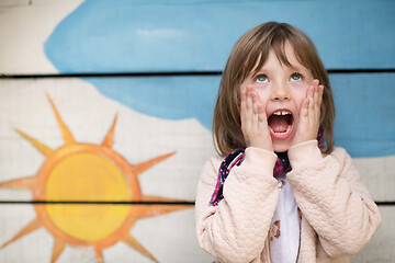 Image showing cute little girl  having fun in playground