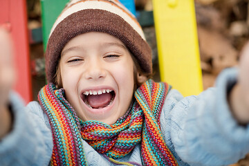 Image showing cute little boy having fun in playground