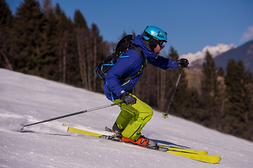 Image showing Skier having fun while running downhill