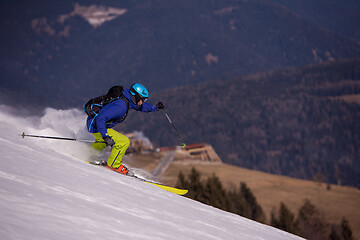 Image showing Skier having fun while running downhill