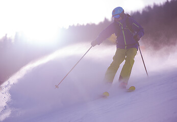 Image showing Skier having fun while running downhill