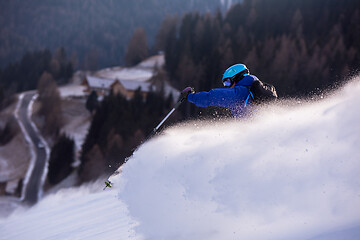 Image showing Skier having fun while running downhill