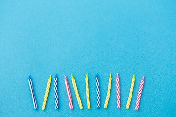 Image showing birthday candles on blue background