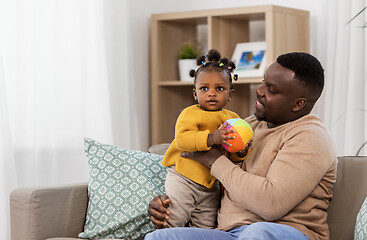 Image showing happy african american father with baby at home