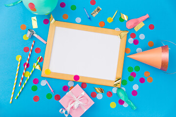 Image showing white board, birthday gift and party props