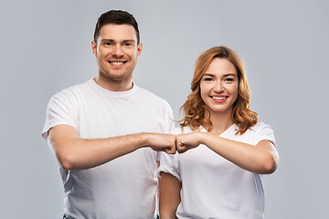 Image showing portrait of happy couple in white t-shirts