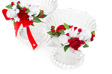 Image showing Crystal glasses with red flower decor