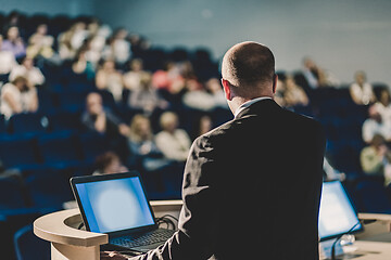 Image showing Public speaker giving talk at business event.