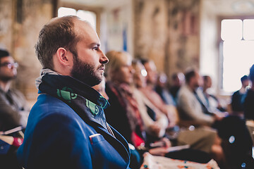 Image showing Entrepreneur in audience at business conference.