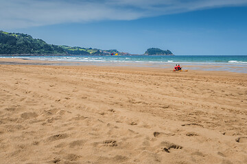 Image showing Lifeguards sitting and watching on the ocean on a beautiful summer day