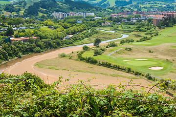 Image showing Aerial view to the river, golf field and city on a beautiful summer day