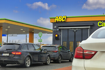 Image showing Cars Waiting Outside Automatic Car Wash