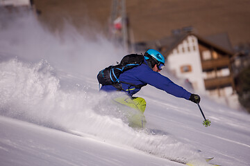 Image showing Skier having fun while running downhill