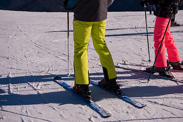 Image showing group of happy people having fun on snow