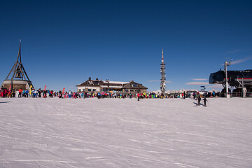 Image showing group of happy people having fun on snow